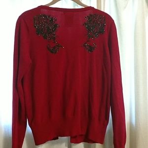 Red cardigan with sparkly shoulder detail